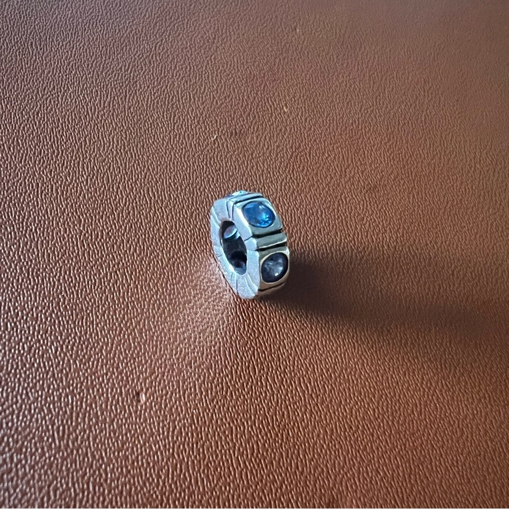 Pandora Trinity Spacer Charm in sterling silver with blue cubic zirconia stones